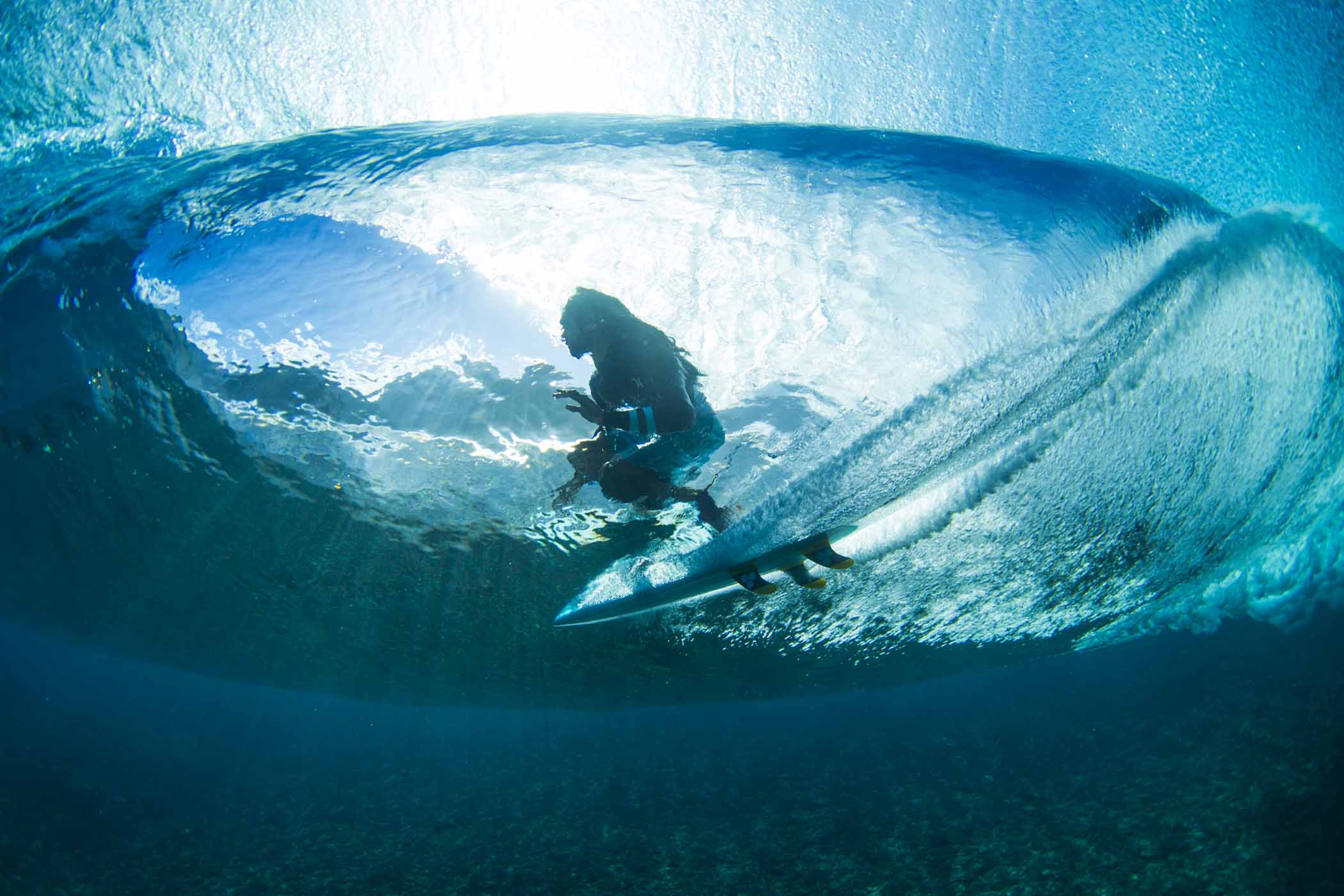 Rob Machado on a 5’5 on a windless crystal clear day at Teahupoo in Tahiti.  This image was part of a story that Rob and Ryan Burch did for SURFER Magazine. Photo: Glaser.