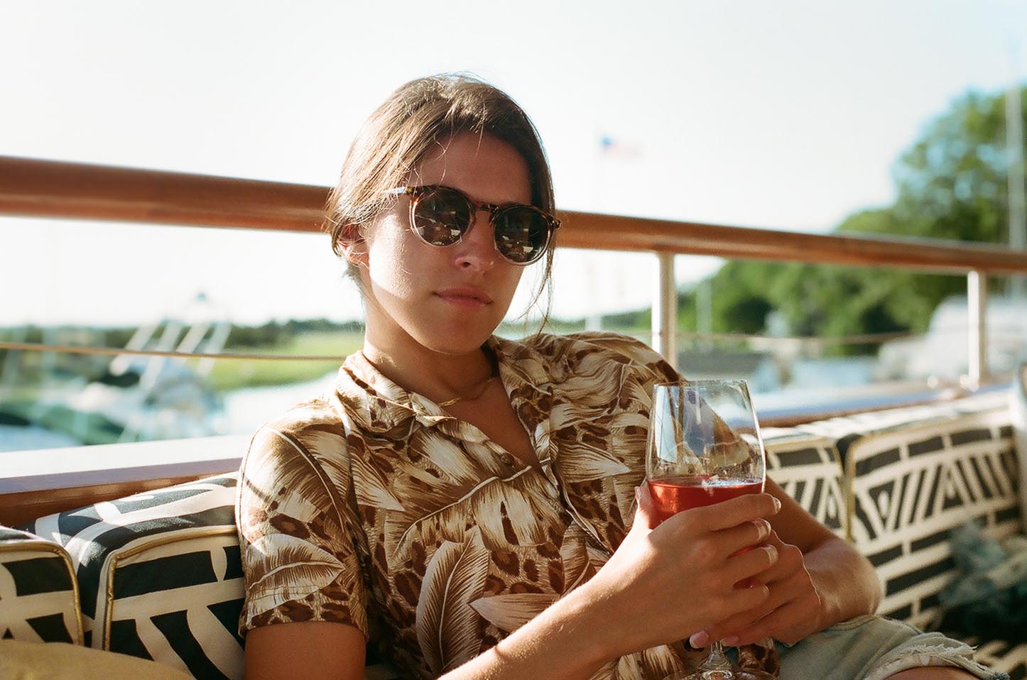Kelsey with rosé... oysters on the way. Photo: Hunter Orahood.