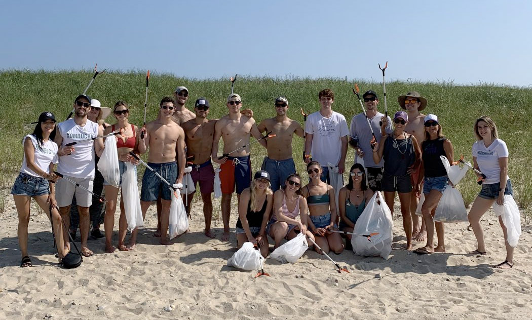 Group of people at a beach cleanup at the Boneyard by Whalebone in Montauk