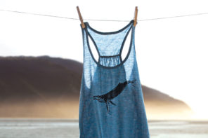 humpback whale tank top hung up on a line at the beach