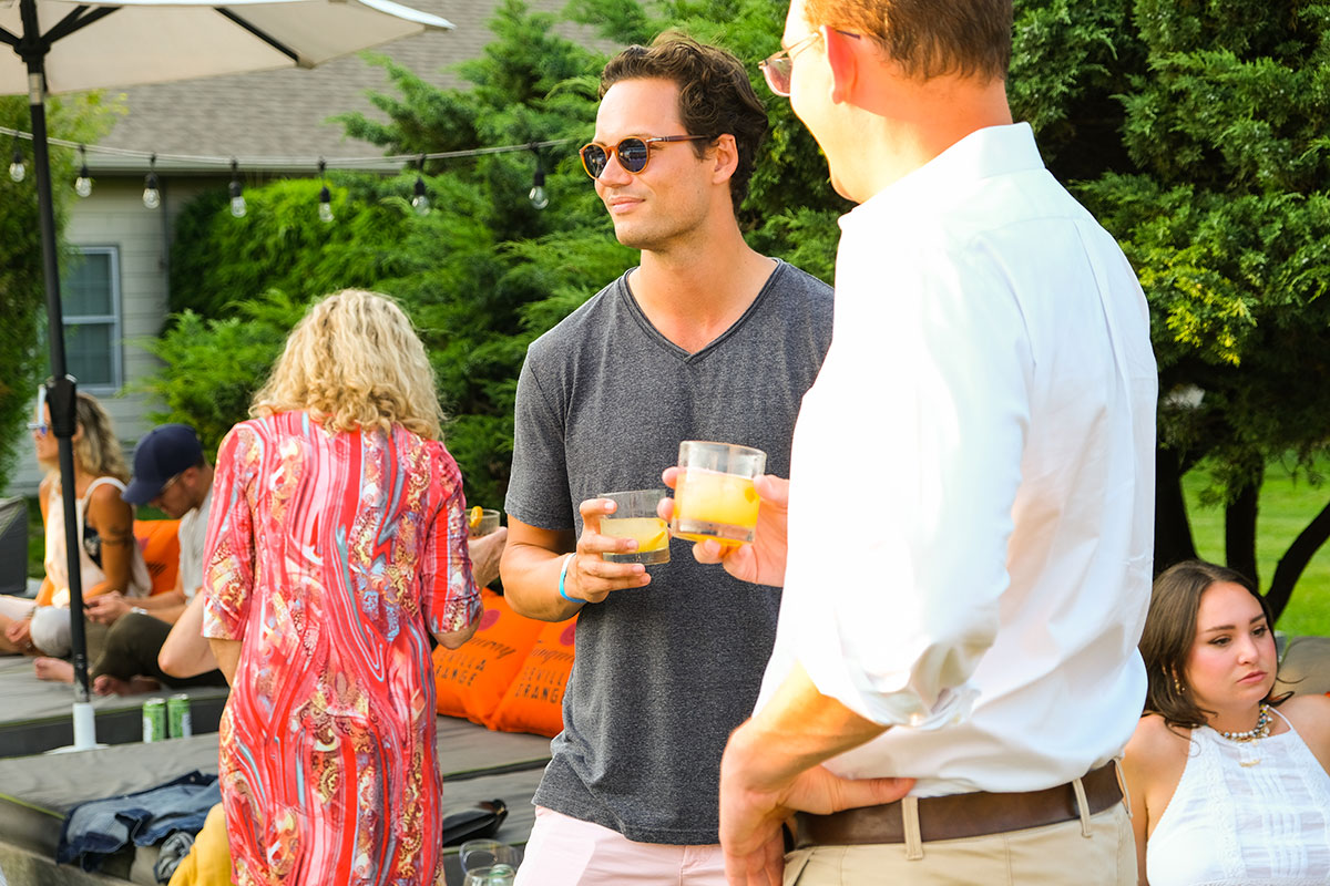 Men drinking at the Tanqueray event at Sole East in Montauk 