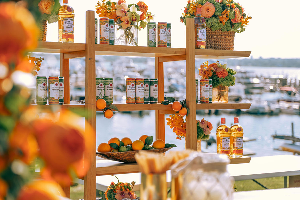 Shelves decorated with oranges and tanqueray at the Whalebone Magazine Sixth Anniversary party at the Montauk Lake House