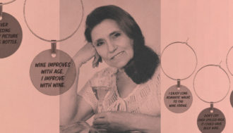 Janice posing with wine charms around image
