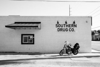 Southern Drug Co. with motorcycle parked outside