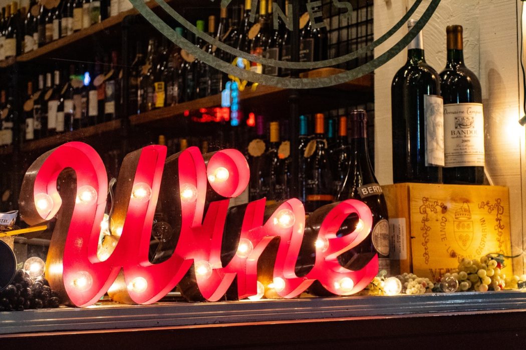 light up wine sign in bars