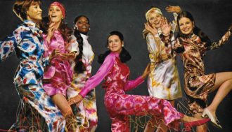 Retro photo of a group of ladies in dyed patterned jumpsuits and dresses.