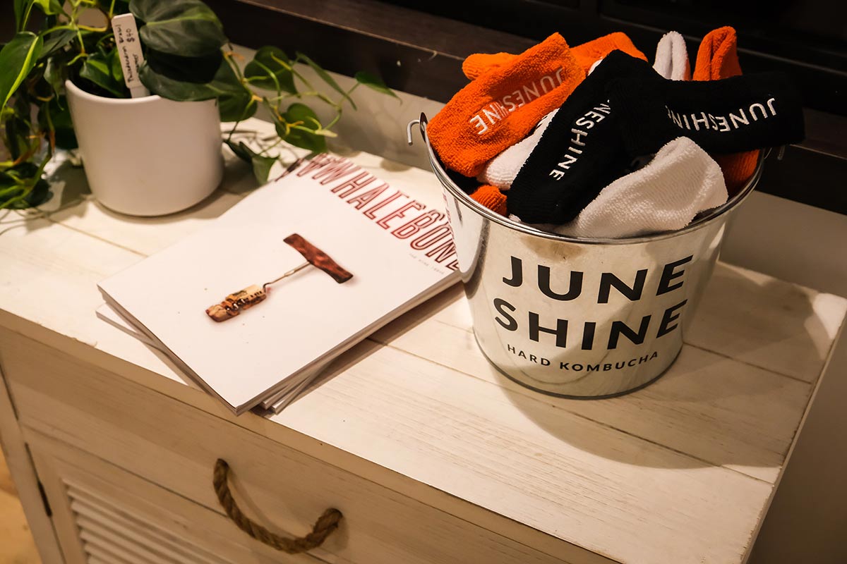 Magazines and gear sit at the Governors Ball pre-game bash with JuneShine and Whalebone Magazine on Bleecker Street.