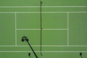 aerial image of green tennis court taken by Mudaassir Ali via Pexels
