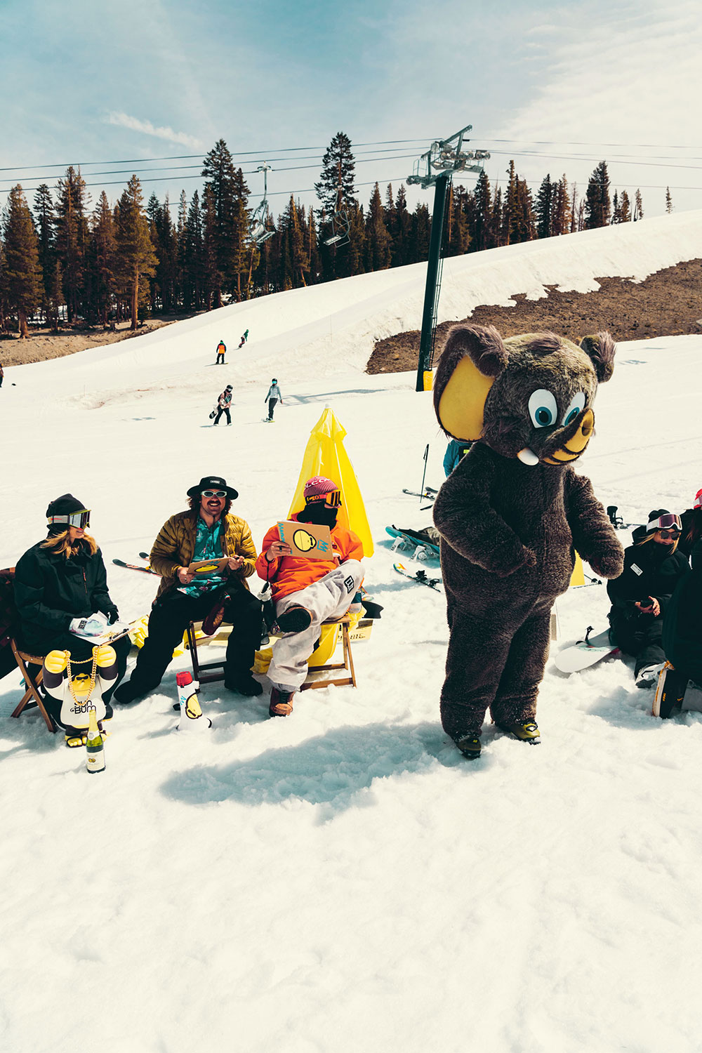 Bum Rush by Sun Bum at Mammoth Mountain, California with mascot Woolly and judges