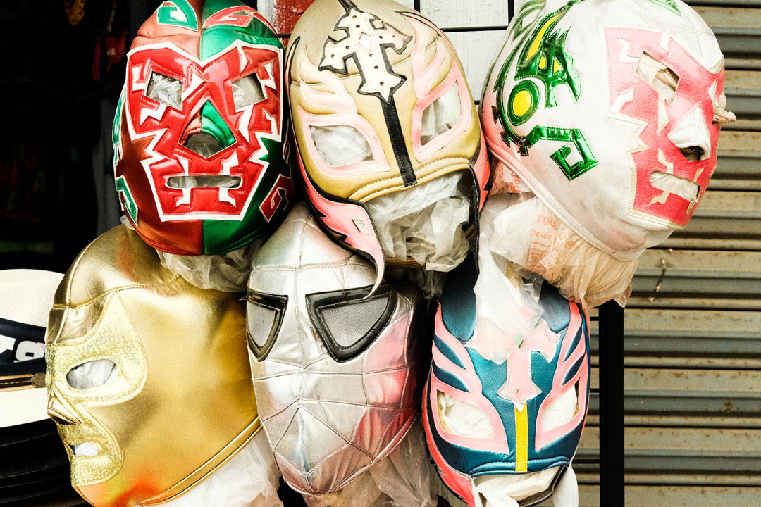 Luchador masks hang together