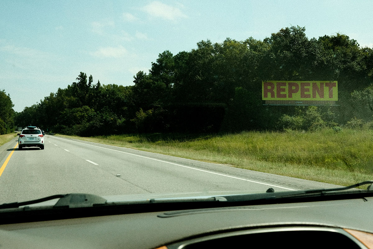 Repent sign on highway