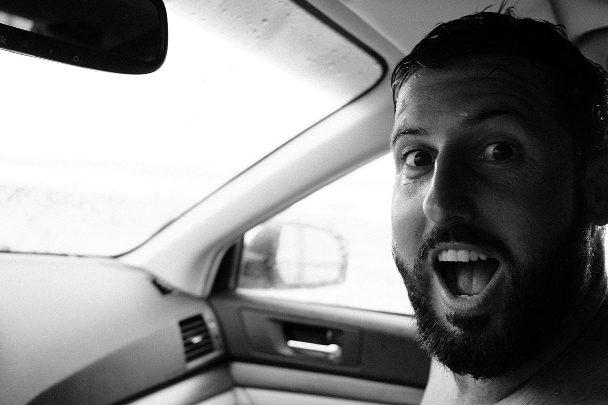excited man in car