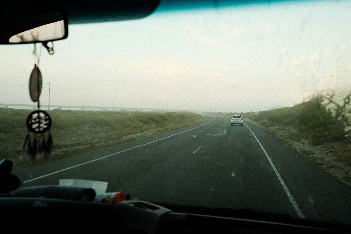 foggy road through dashboard