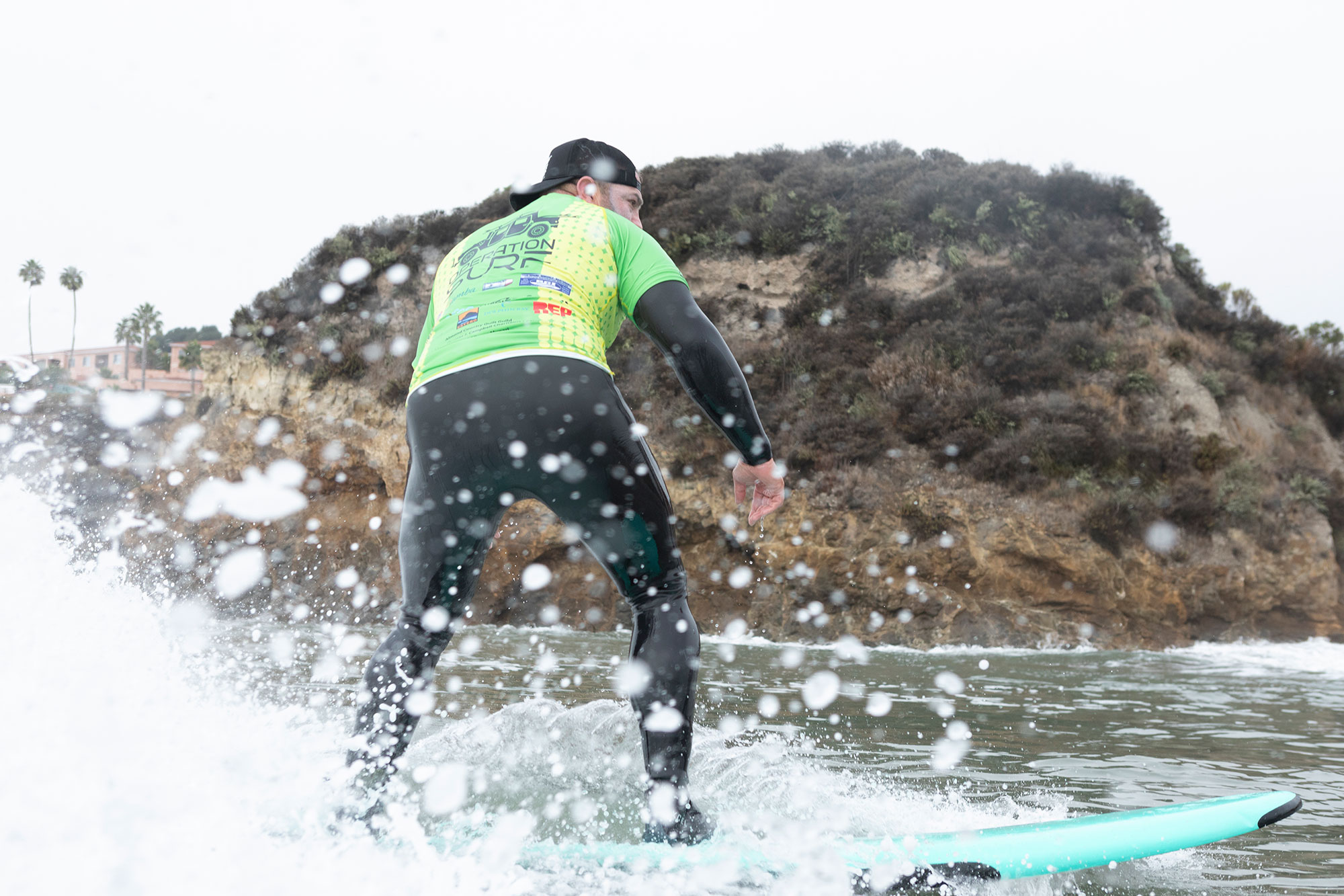 Neil, veteran, surfing with operation surf