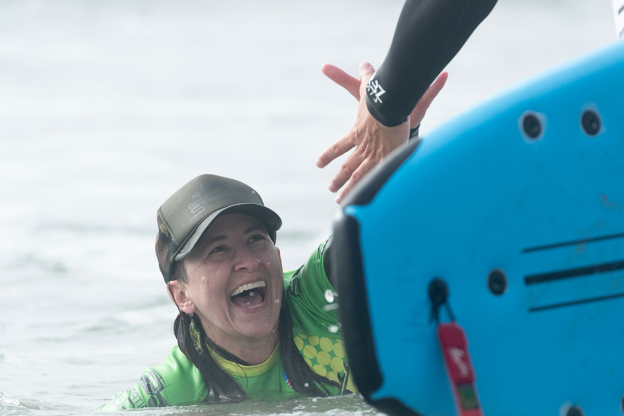 Stephanie, veteran, in water with Operation Surf