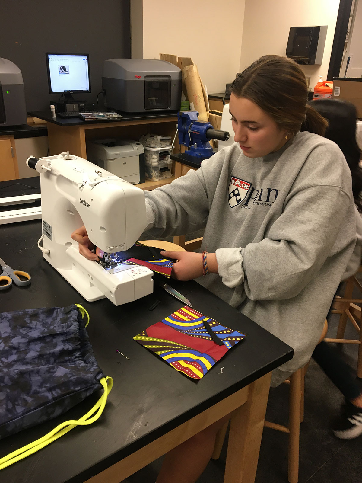 Pennington Stem student sewing WISSP pad