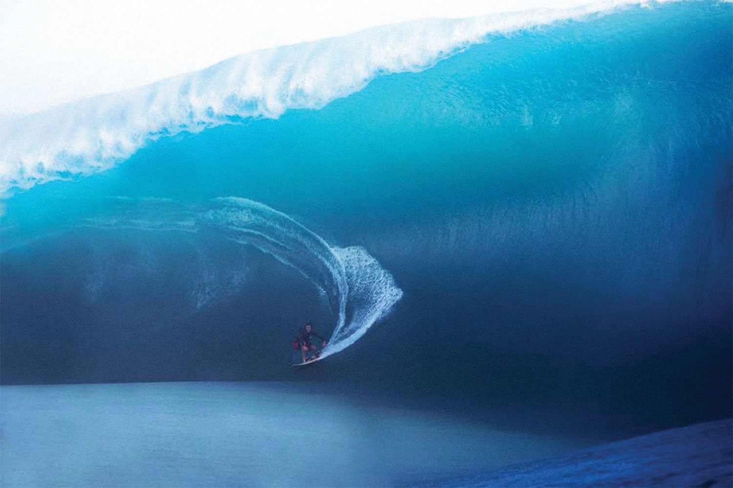 Keala Kennelly surfing a big wave