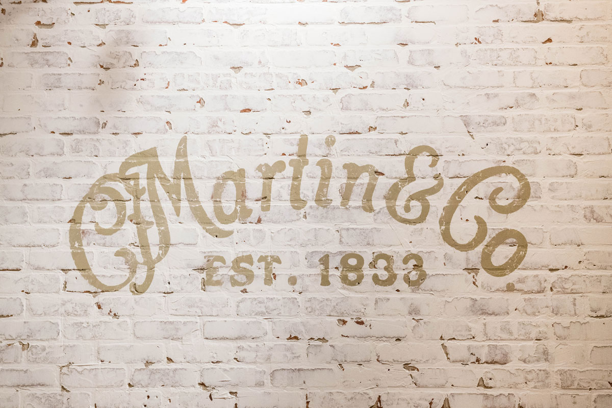 Martin & Co. est. 1833 sign painted on the wall.