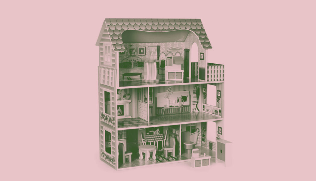 dollhouse on pink background