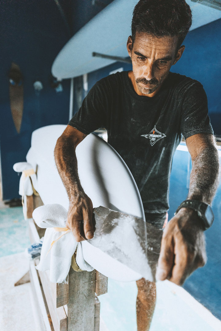 Juan Diego shaping a surfboard