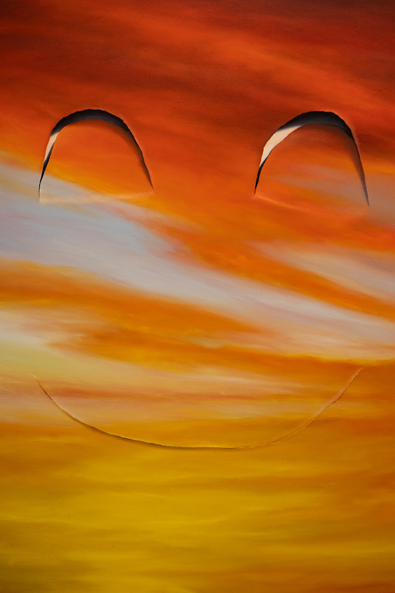 A photo of Jeremy Shockley's oil on canvas painting entitled "Double Double." The painting is an ombre bright orange, red and yellow and looks like the light beams of a sunset are flooding across it.The painting is painted to look as if there are tears in the painting itself that form the shapes of a large smiley face.