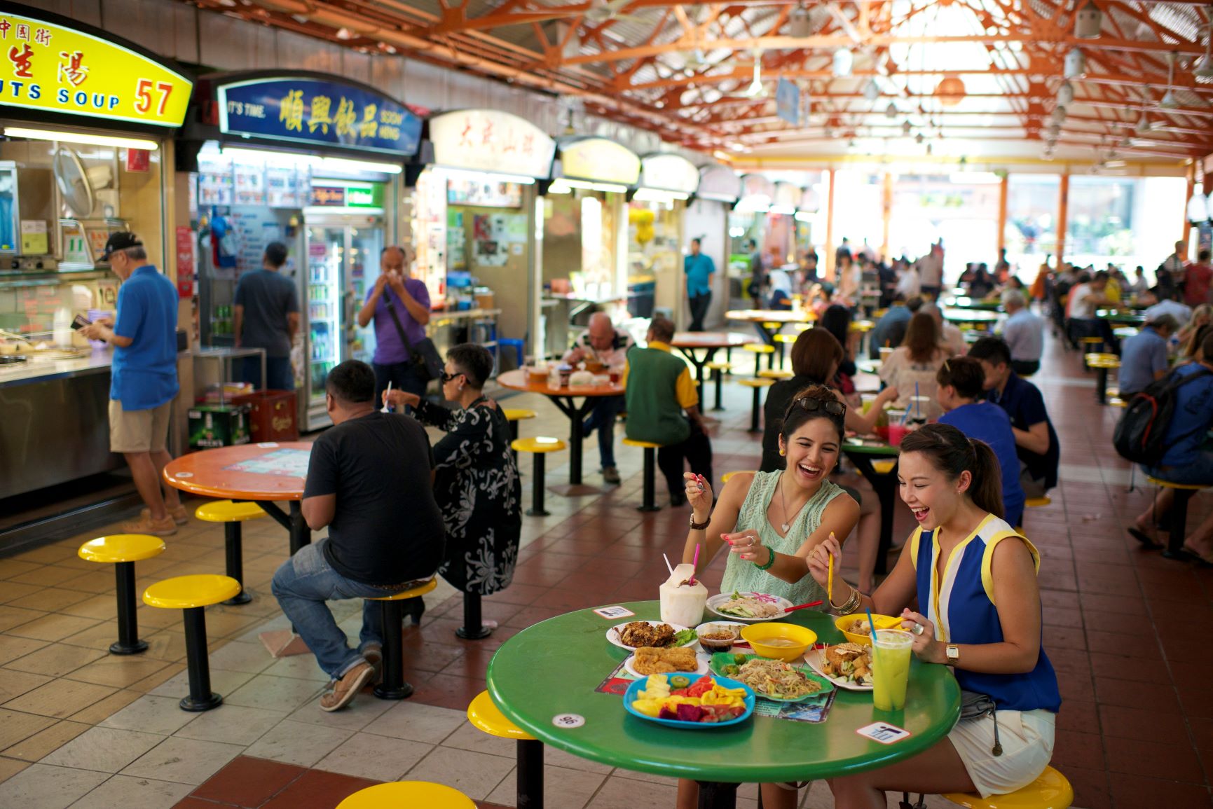 People eating at Maxwell Food Centre, Singapore