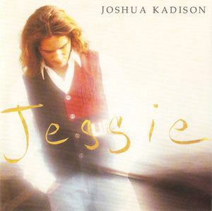Jessie by Joshua Kadison album cover of a man in a red vest on a white background. 