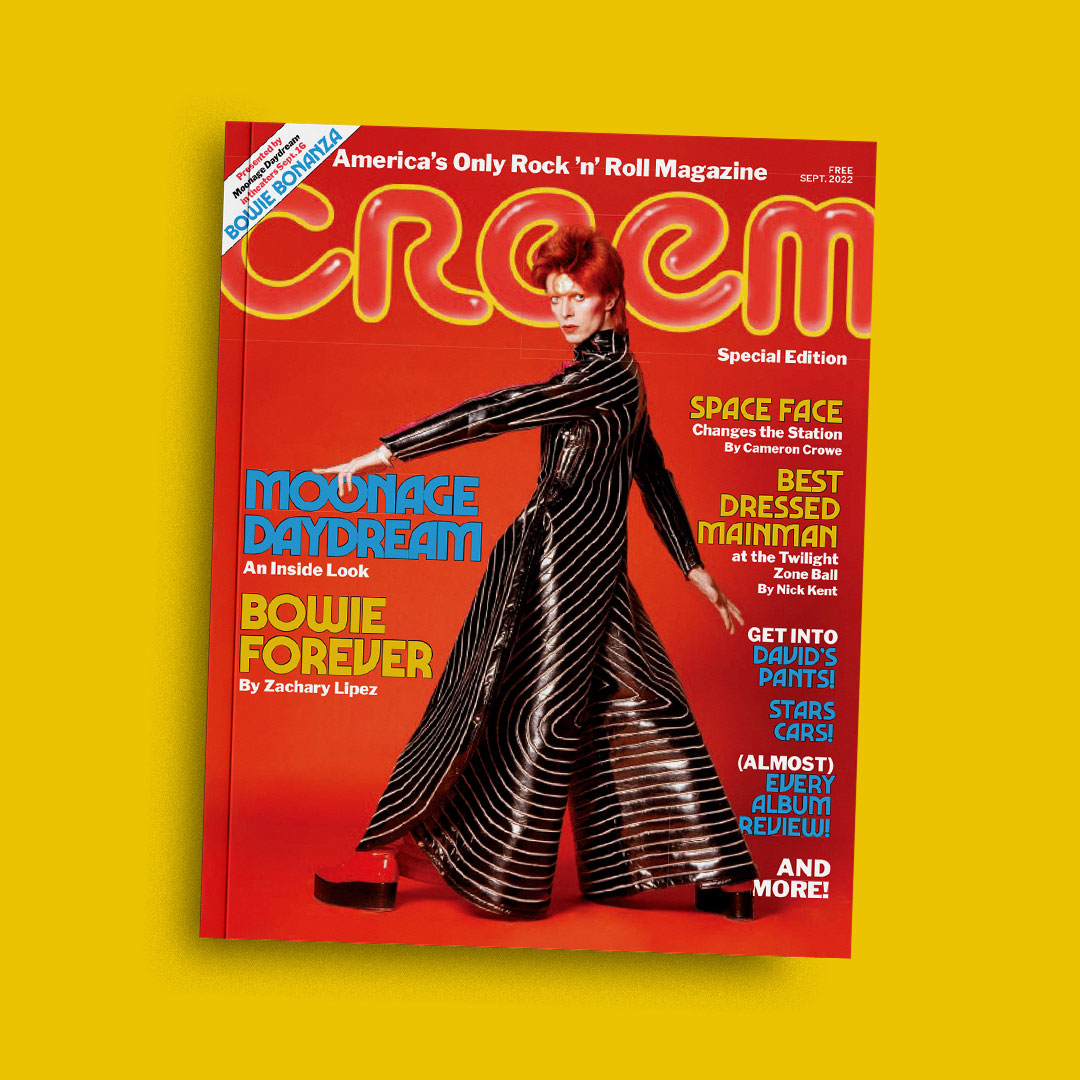 Photo of CREEM's David Bowie Special Edition September 2022 Issue set against a bright yellow background. David Bowie is on the cover of the magazine and is twisted around to face the camera in his signature Ziggy Stardust red hair and a reflective black and silver lined jumpsuit.